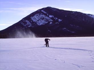 Gregor trying to shovel Lake Johnson