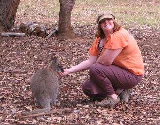Lisa McLintock feed a Wallaby