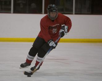 Ryan Hellyer playing ice hockey for the Dunedin Bears