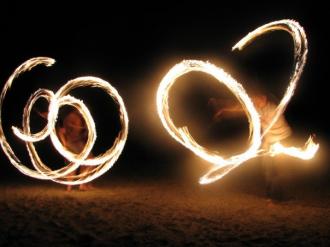 Neil Dudley and Rob Owens waving fire #1